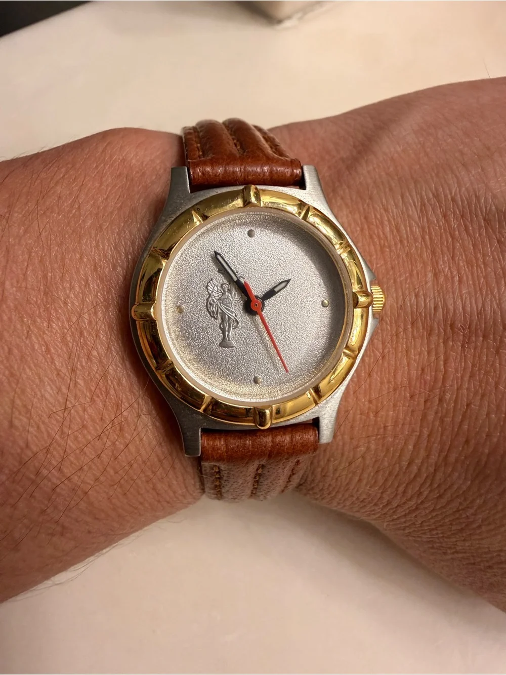 Brown Leather-Strap Watch with Gold-Bezel Accent need battery